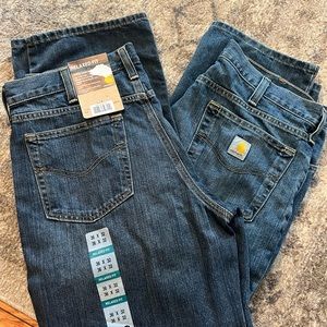 2 pair of Carhartt jeans one NWT other tags off but never worn. Size 36-32